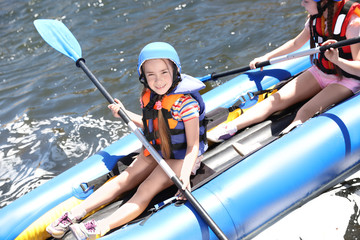 Wall Mural - little children kayaking on river. summer camp