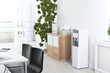 © New Africa - Modern water cooler in stylish office interior