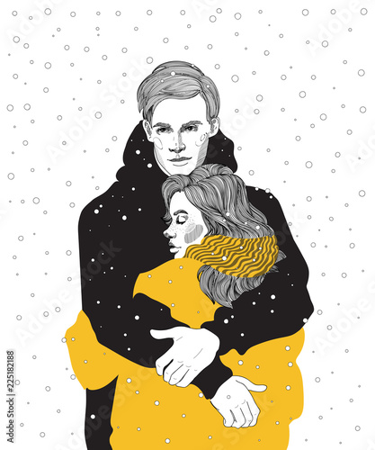 Fotografía vector cute young couple in bright down jackets hugs under a snowfall, a meeting