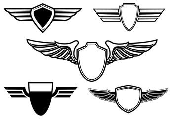 Wall Mural - Set of retro emblems with wings. Design element for poster, logo, label, emblem, sign, t shirt.