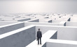 © ra2 studio - Small businessman in a middle of a huge maze