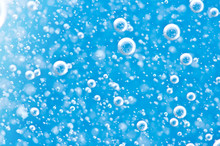 Bubbles Of Oxygen Under Water. Water Blue Structure. Macro