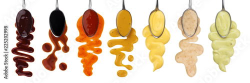 Cuadros en Lienzo Different sauces with spoons isolated on white background