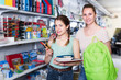 © JackF - Charming teenager and woman buying products in stationery shop