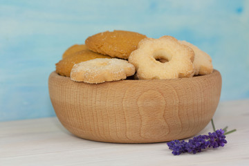 Wooden bowl with delicious cookies.