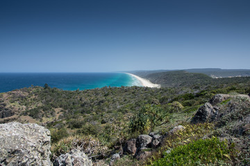 shoreline and beach on a cloudless summer day a noosa north shore, queensland, australia