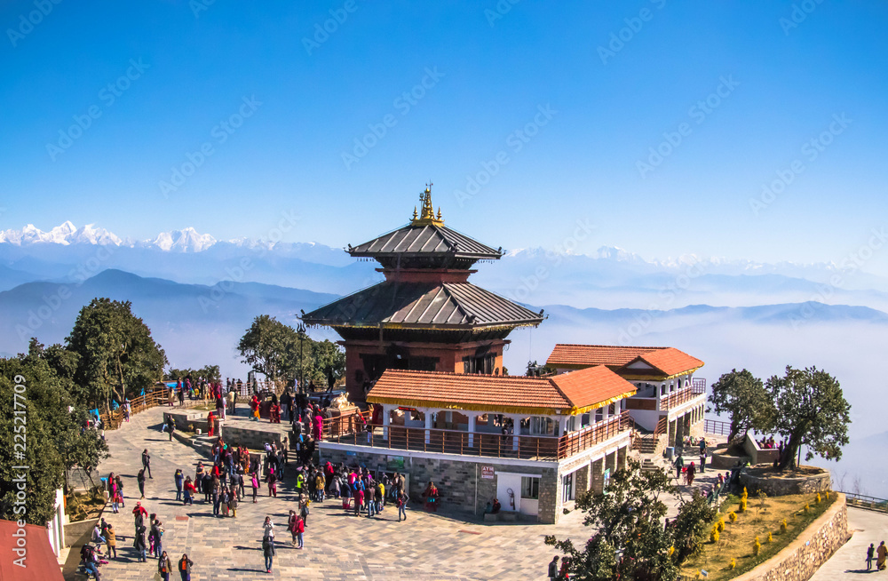 Bhaleshwor Mahadev Temple with Himalaya range in the backdrop in Kathmandu, Nepal - obrazy, fototapety, plakaty 