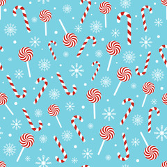 Christmas seamless pattern with candy canes, lollipops, snowflakes, snow ball on blue background. Design for wrapping paper, print, greeting cards. Winter Holiday concept. Vector illustration