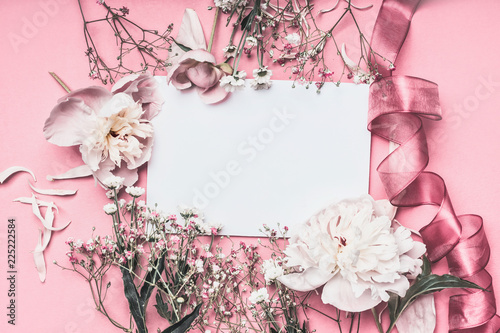 Flowers And Petal Arrangement Around Blank Paper On Pink Petal Arrangement Around Blank Paper