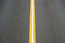 white line on asphalt road - two lane street -