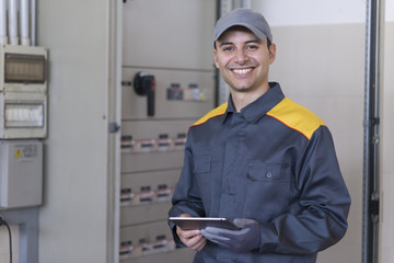 portrait of an electrician at work