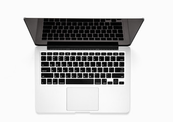 Fototapete - Top view, Blank white screen template for advanced laptop on a white background. Used for graphic products.