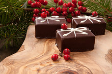 Christmas Chocolate Candy And Red Berries