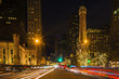 Long exposure of traffic speeding by on Michigan Avenue in Chicago at Christmas