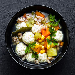 Delicious vegetable soup with chicken meatballs and pearl barley