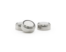 Button Cell On Isolated Background. Small Watch Lithium Battery ( Clipping Path Or Cutout Object For Montage )