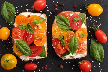 Wall Mural - Sandwiches with cheese and tomatoes.