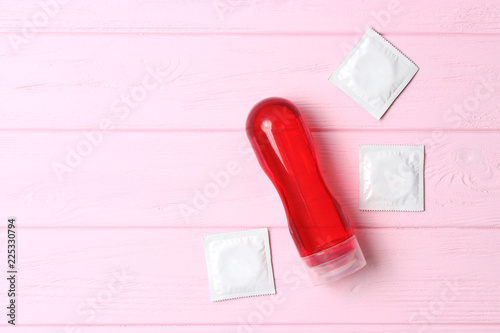 Cuadros en Lienzo an intimate lubricant on a colored wooden background