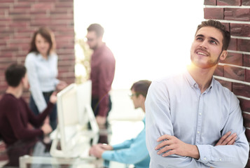 Sticker - Businessman with colleagues in the background in office