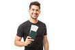 © AntonioDiaz - Portrait Of Happy Young Guy Holding Passport And Boarding Pass