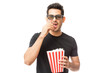 © AntonioDiaz - Handsome Young Man Eating Popcorn While Watching 3D Film