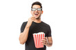 © AntonioDiaz - Smiling Young Man Watching 3D Movie While Eating Popcorn