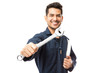 © AntonioDiaz - Confident Mechanic Showing Wrench Against White Background