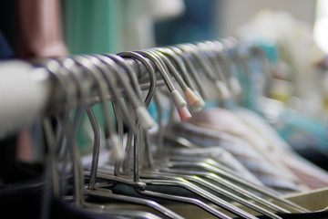 Clothes hangers on clothes rack