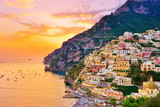 Fototapeta Londyn - View of Positano village along Amalfi Coast in Italy at sunset.