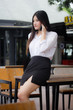 © tiniroma - Portrait of thai adult office girl calling smart phone