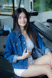 © tiniroma - Portrait of thai adult beautiful girl blue jeans relax and smile