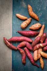 Purple and orange sweet potatoes, close-up