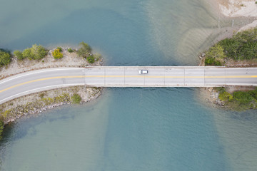 Wall Mural - Aerial view of a road bridge over a lake in Washington State, USA