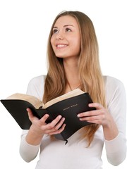 Wall Mural - Young Woman Holding The Holy Bible - Isolated