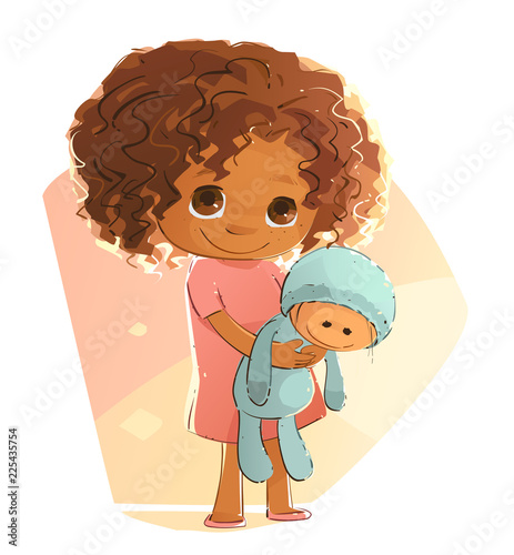 little girl holding doll