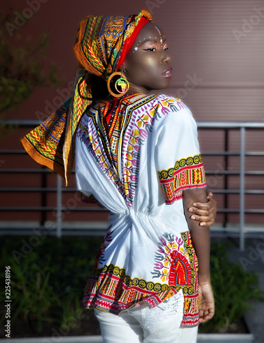 Young Jamaican Woman Wearing Traditional African Clothes And Style