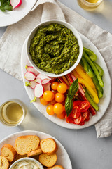 Poster - Vegetable snacks pesto sauce served plate top view