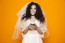Happy Dead Bride Looking Camera And Holding Smartphone Isolated