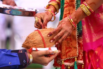 indian wedding candid Photography with human hand with designs.