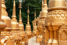 Detail Of Thai Great Many Golden Pagodas Of Wat Pasawangboon, Saraburi