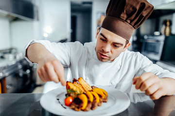 Wall Mural - Focusing on details makes his food perfect