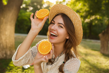 Close up of lovely young girl in summer hat