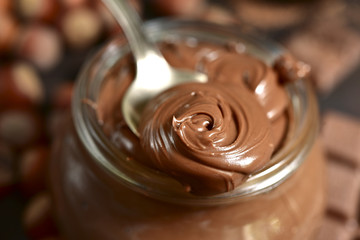 Homemade chocolate hazelnut spread in a vintage jar.