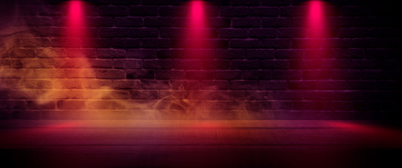 Background of an empty dark-black room. Empty brick walls, lights, smoke, glow, rays