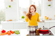 © deagreez - Lady in yellow pullover, with tomato, cucumber, pepper, cabbage,