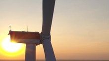 Drone Circles Right Sunrise Red Sky Clear Sky Windpower Windmill GE Turbine Gondel