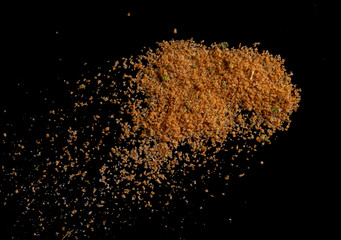 Sticker - Chilli pepper spices seasoning for soup with vegetables on black background