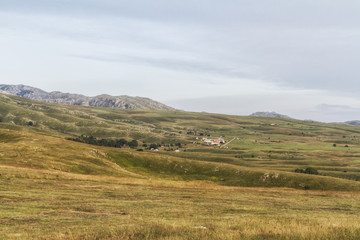 Beautiful landscape in Montenegro with fresh grass and beautiful peaks. Durmitor National Park in Montenegro.