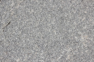 Granite background. Texture of gray granite stone. Natural pattern in gray tones. Abstract background