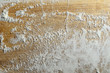 Flour Scattered on Old Wooden Chopping Board